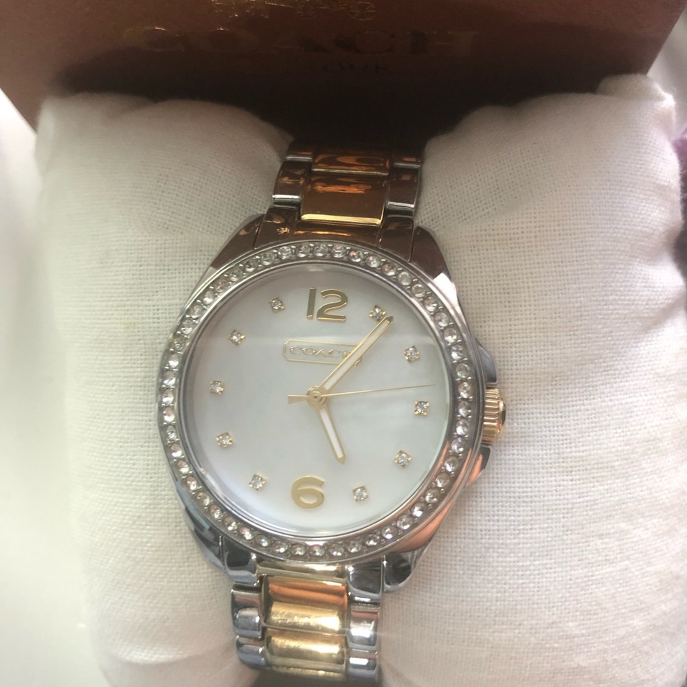 Coach Watch Mother of Pearl with crystal face in Gold and Silver.